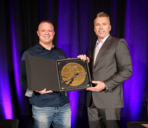 Nathan Hawkes accepts a top 100 digital marketing leaders award
