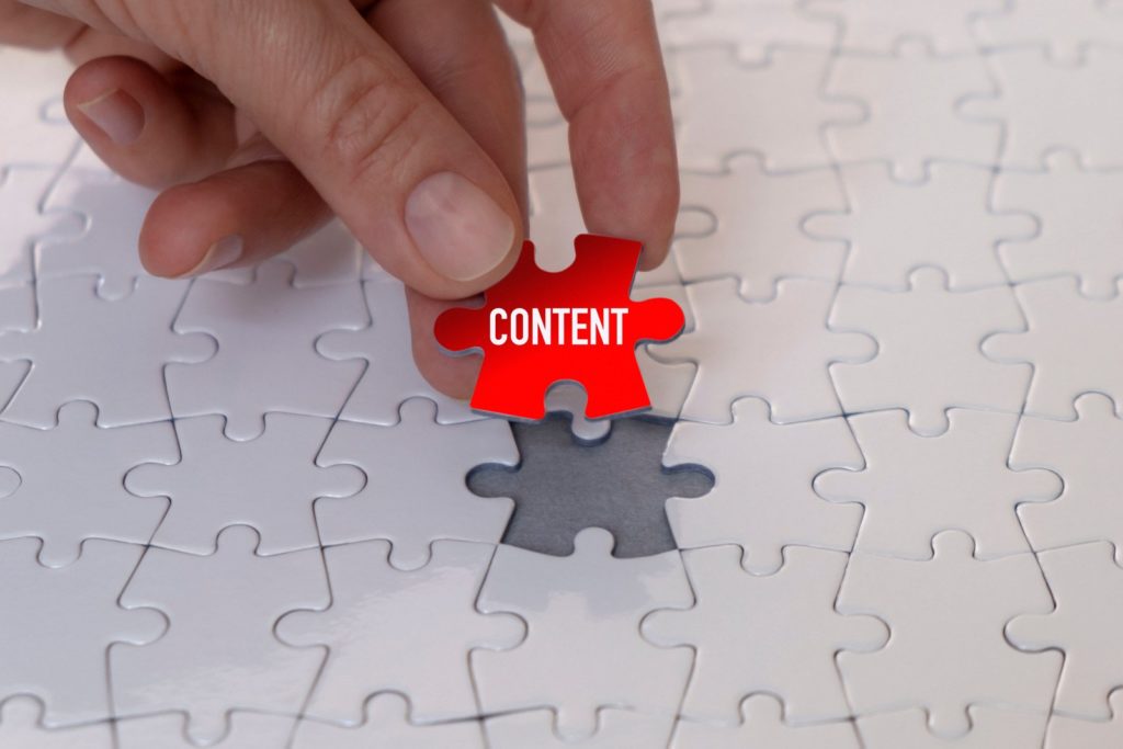quality seo content is the missing red puzzle piece in a white puzzle